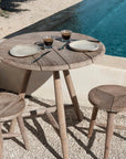 Low Dining Bistro Round Table Faye | Teak Natural Grey - NU PUUR & GROEN